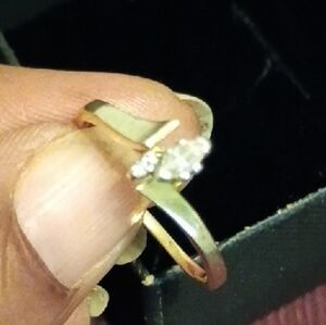 14K solid yellow gold marquise-cut diamond engagement ring.